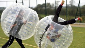 Bubble Soccer - The Objective of Bubble Soccer is to score against the opponent's net and knock each other down while trying. You could argue that this is one of those games where defense is more fun.