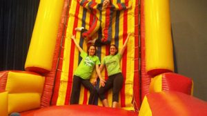 Velcro Wall - Participants put on a Velcro suit and attempts to attach themselves to a 4-foot inflatable wall.